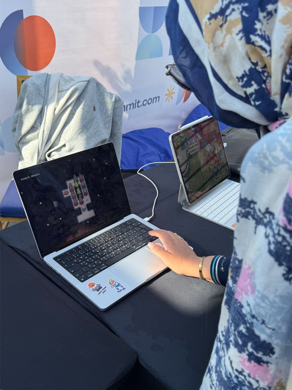A player trying Chloe Puzzle Game at Techne Summit